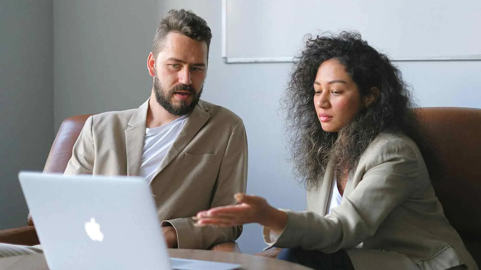 Attorney walking a client through the title search evidence for a quiet title action