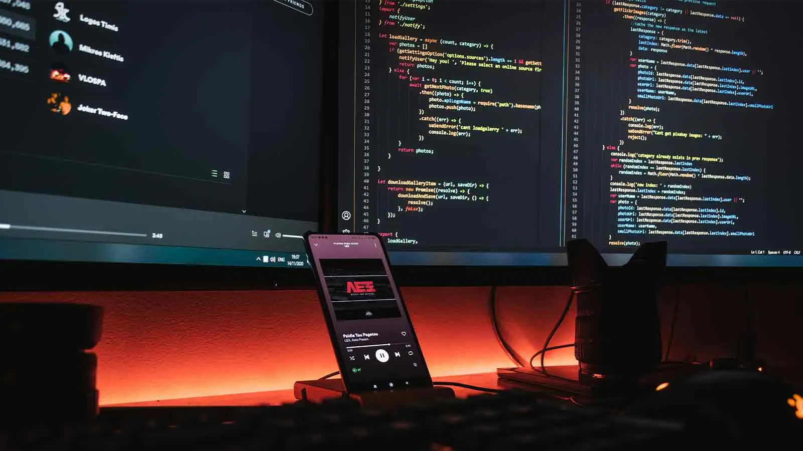 Analyst tracking real estate market data across multiple monitors