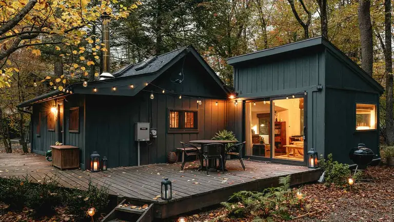 Mountain cabin at dusk, the kind of Aspen-area property found in Pitkin County records