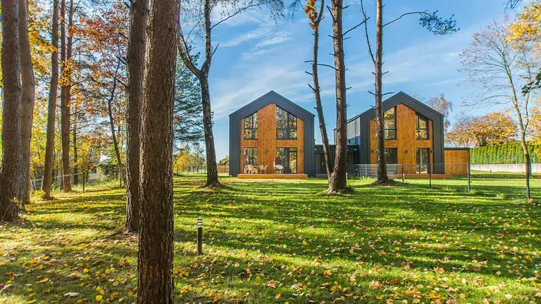 Modern cabins in autumn woods, each recorded with the register of deeds