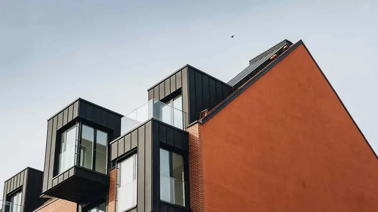 Modern apartment building, the kind of asset protected by rigorous title research