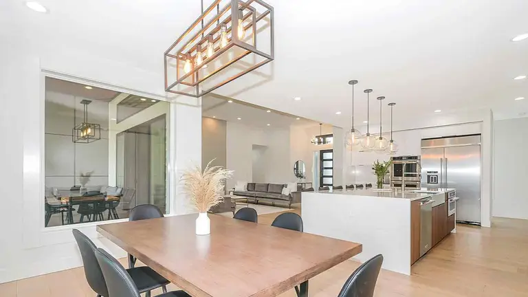 Modern kitchen and dining area funded through a construction escrow account
