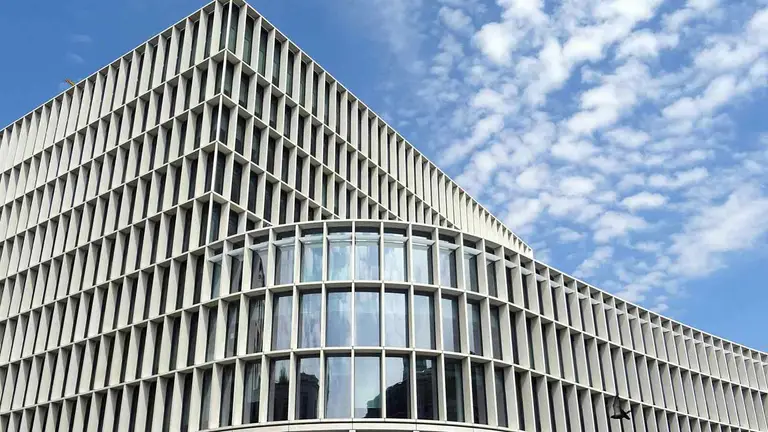 Curved modern office building, home to records used in Nolan County land research